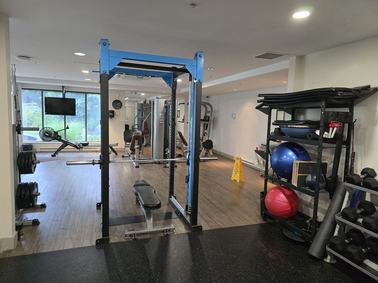 Fitness centre squat rack and bench