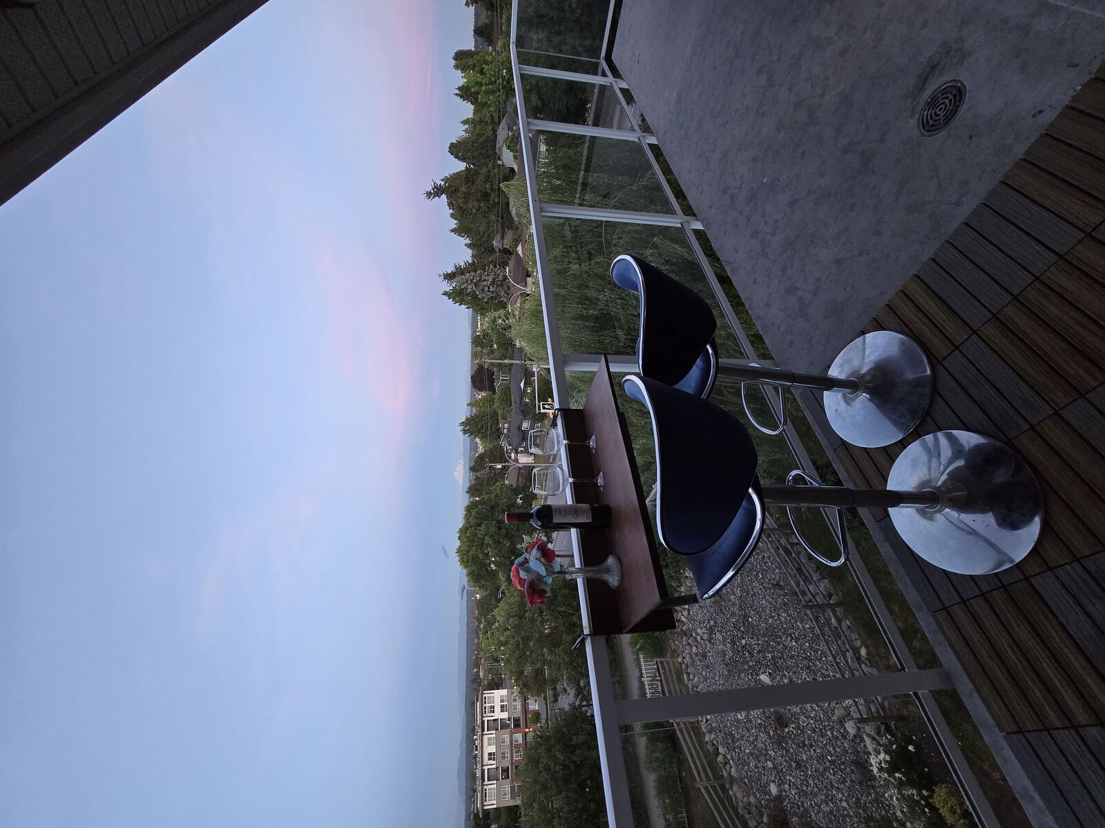 Private wraparound balcony with bar seating overlooking Surrey