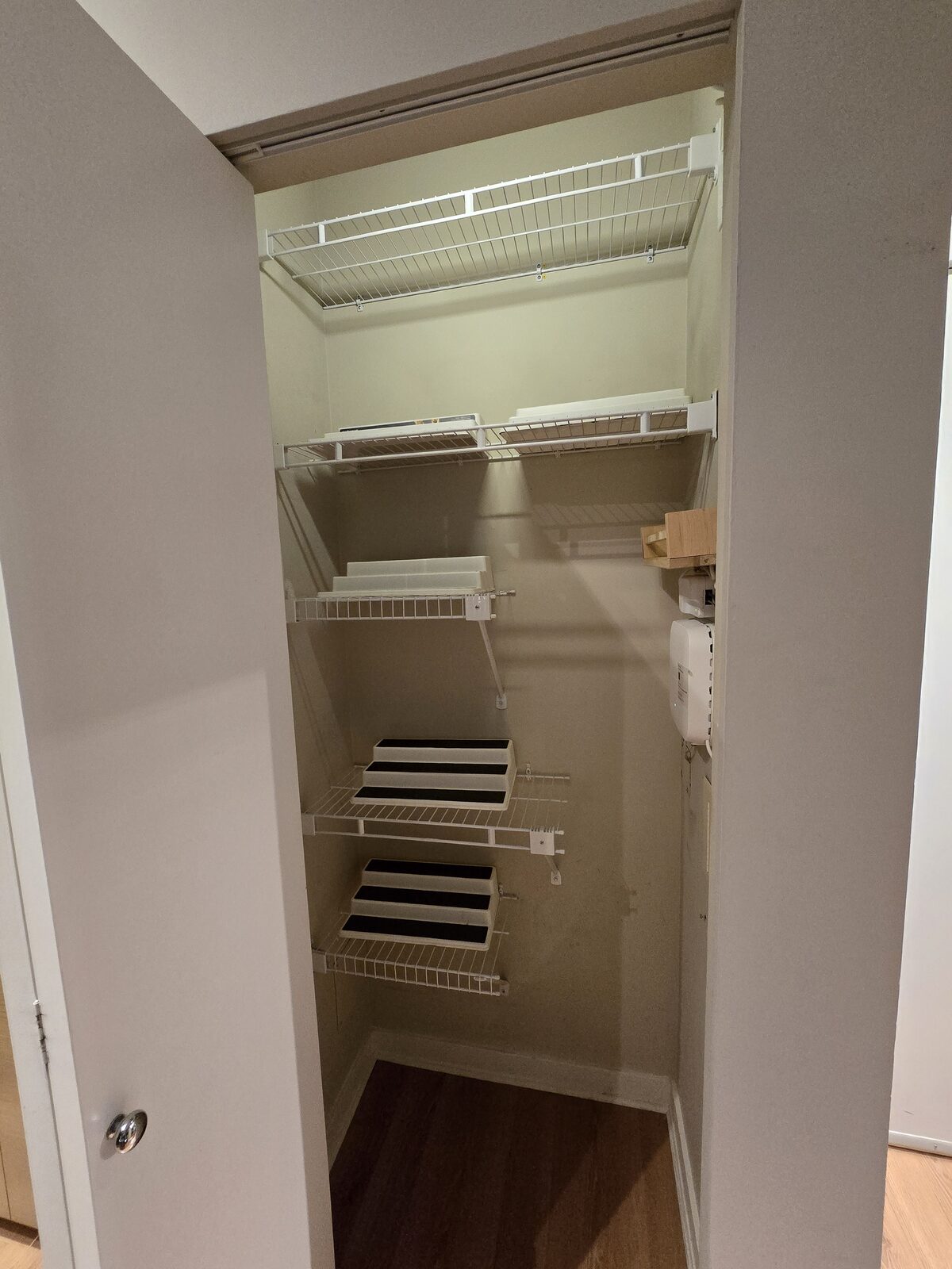 Pantry closet with adjustable wire shelving for kitchen storage