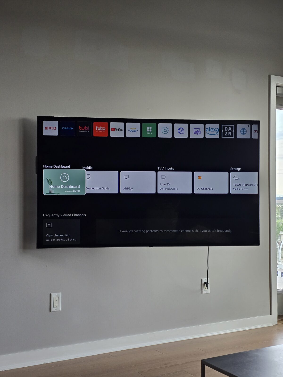 65 inch LG smart TV with streaming app home screen